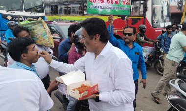 Manas Choudhury distributes sweets and chocolates, on stay order on Rahul Gandhi's conviction