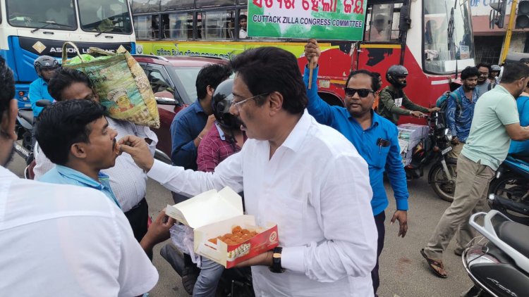Manas Choudhury distributes sweets and chocolates, on stay order on Rahul Gandhi's conviction