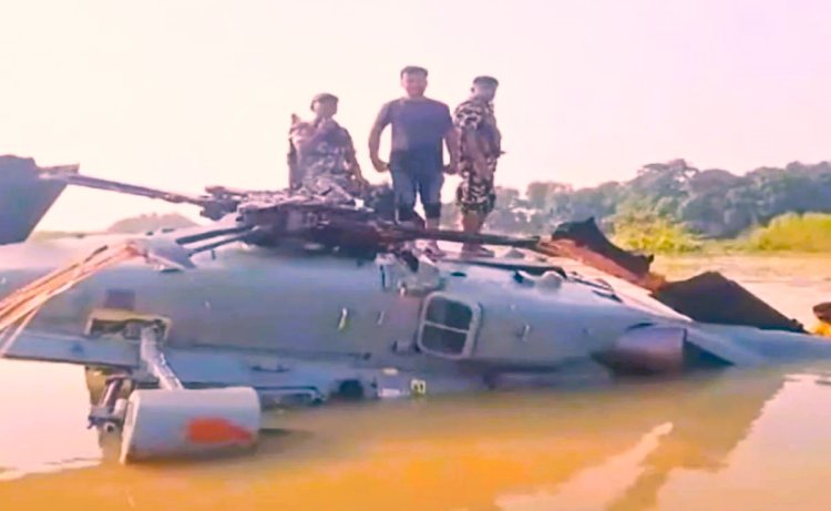 An Indian Air Force helicopter, which was air-dropping relief supplies, made a forced landing in Bihar.